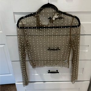 Adorable new embellished top!  Cute paired with a tank and jeans or dressed up!
